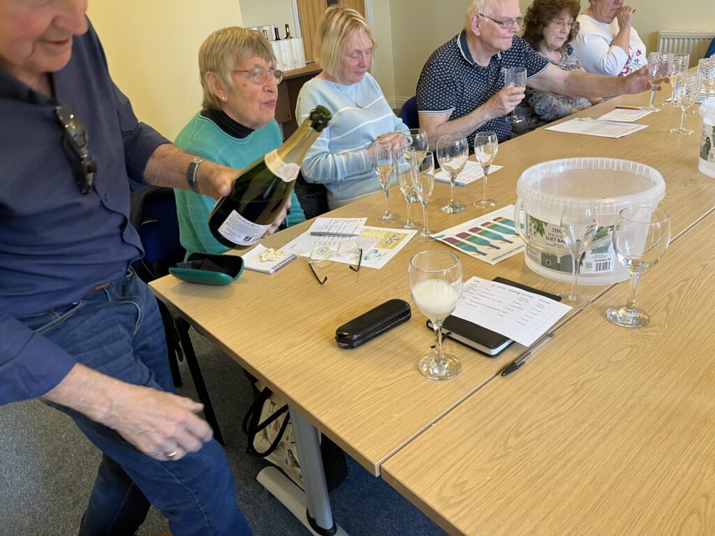 Members tasting wine